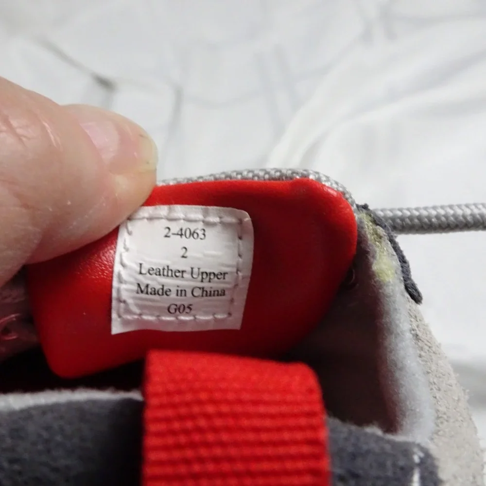 2 Sets Of Vintage Infant shoes. White pair and a Gray/Red pair.